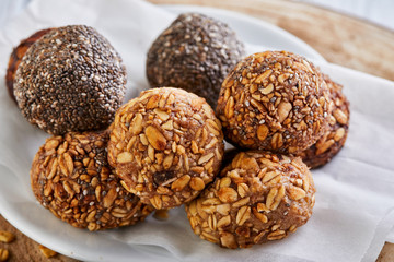 Poster - Healthy Organic Energy balls Muesli Bites with Nuts, Cocoa, Chia and Honey - Vegan Vegetarian Raw Snacks or Food. copy space. Close-up