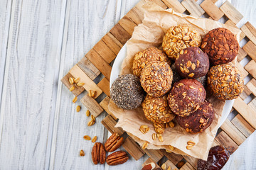 Poster - Healthy Organic Energy balls Muesli Bites with Nuts, Cocoa, Chia and Honey - Vegan Vegetarian Raw Snacks or Food. copy space.