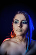 © Наталья Новикова - ethnic girl on a black background in blue light