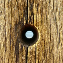 Full Frame Shot Of Wood With Hole