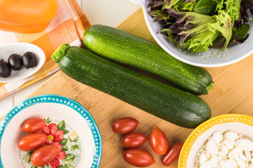 Wall Mural - Spiral zucchini noodles salad with variety vegetables.