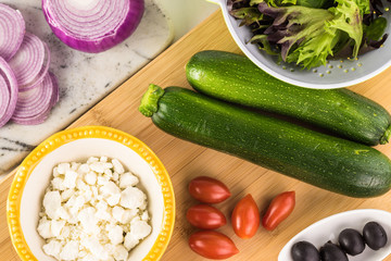 Wall Mural - Spiral zucchini noodles salad with variety vegetables.