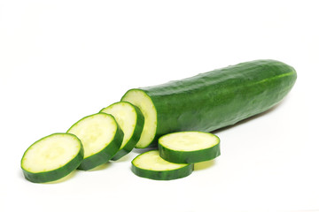 Wall Mural - Fresh cucumber with cut and slice isolated on white background