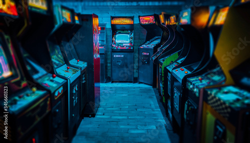 Arcade Video Games In An Empty Dark Gaming Room With Purple Light With Glowing Vintage Displays And Beautiful Old Retro Design Stock Images Page Everypixel