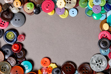 Fototapete - Background and texture of multicolored antique buttons