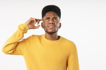 Wall Mural - Portrait of handsome african young thoughtful man