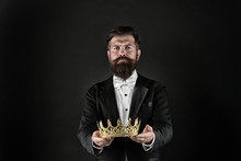 Reputation And Status. Glory And Ambitions. King Crown. Royal Coronation Symbol. Now Come And Make It Worth. Crown In Hands. Handsome Man Give Crown Black Background. Getting Reward. Crowning Glory
