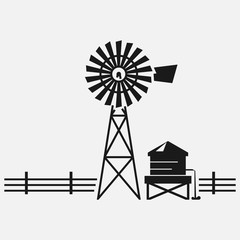 Traditional American water well windmill black and white vector icon.