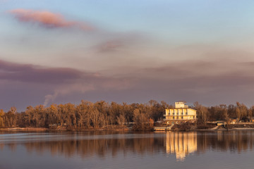 Landscape view of the opposite bank of the Dnieper River at sunset