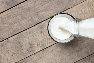 Sticker - milk pouring into glass