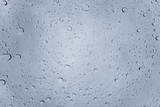 Fototapeta Tęcza - Raindrops on the window during storm, Europe