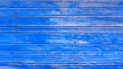 Poster - wall of wooden boards with old blue paint.