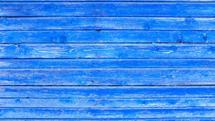 Poster - wall of wooden boards with old blue paint.