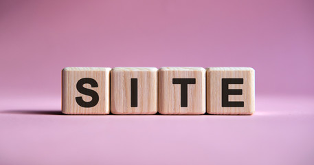Poster - Website text on cubes on a pink background