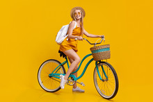 Summer Mode. Portrait Of Stylish Girl Riding Vintage Bicycle And Smiling