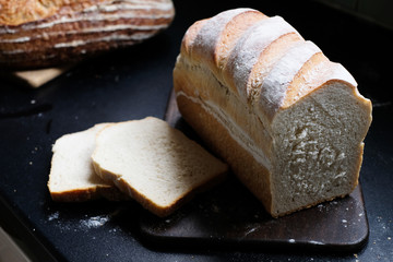 Delicious homemade white bread loaf sliced