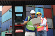 © sittinan - Engineering group working and they are loading container for support logistics and import export business