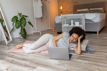 Sticker - Woman surfing the net on laptop computer