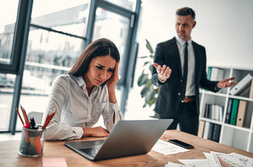 Businessman and employee in office