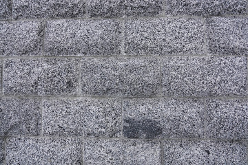 wall fence made of granite blocks