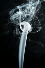 White smoke on black background