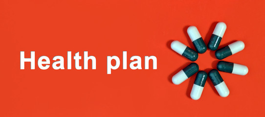 Health plan - white text on a red background with pill capsules