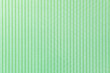 Texture. Polycarbonate sheet. Plastic. Green color. Vertical stripes