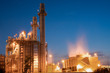 © bannafarsai - Gas turbine electrical power plant during sunset and twilight time