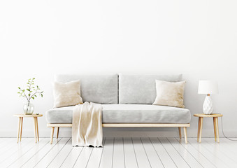 Interior wall mockup with gray velvet sofa, beige pillows and plaid, branch in vase and lamp on coffee table in living room with empty white wall background. 3D rendering, illustration.