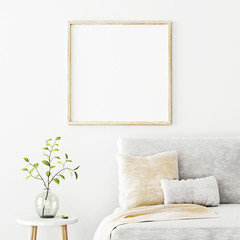 Poster - Poster mockup with square frame hanging on the wall in living room interior with sofa, beige pillows and green branch in glass vase on empty white background. 3D rendering, illustration.