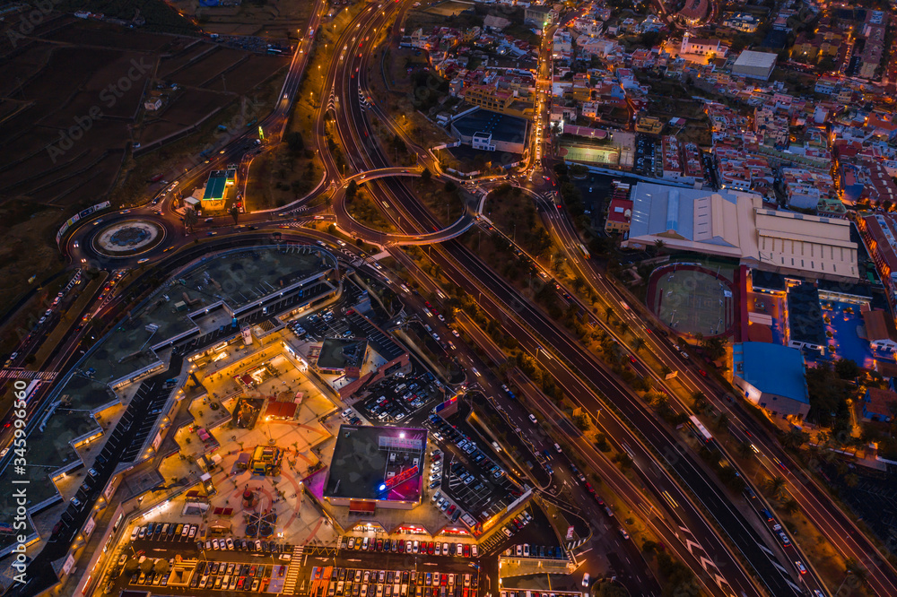 night highway and road interchanges shooting from a drone - obrazy, fototapety, plakaty 