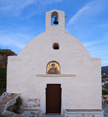 Wall Mural - Ancien chapel with mosaic icon of of Saint George above Panagia Church in Chora town on Ios island, Cyclades, Greece