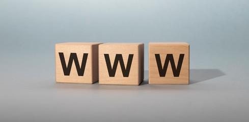 Aufkleber - WWW text on wooden cubes on grey background