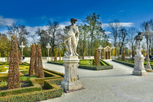 Beautiful Green Garden With Statues In The Park At Wilanow District.