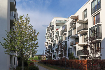 Wall Mural - Cityscape of a modern residential area with apartment buildings, new green urban landscape in the city