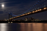 Fototapeta  - Illuminated George Washington Bridge at night with full moon