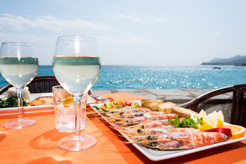 Mediterranean lunch with the sea in the background