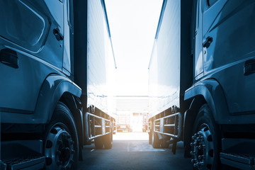 Cargo Trucks Parked lot at The Warehouse. Delivery Container Trucks. Cargo Shipping. Lorry. Industry Freight Truck Logistics Cargo Transport Concept.	