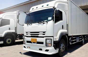 Wall Mural - white truck docking at warehouse, truck loading, road freight cargo shipment transport