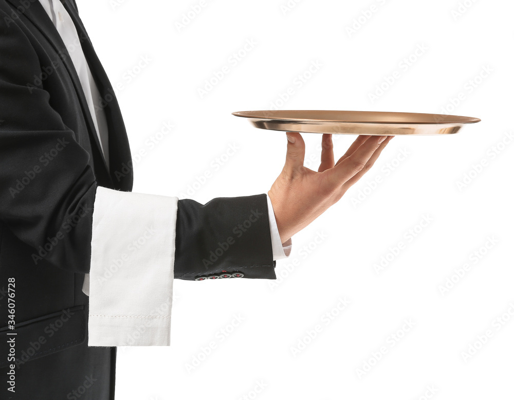 Handsome male waiter with empty tray on white background