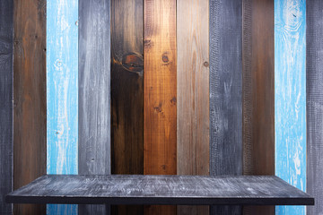 Poster - wooden shelf at board plank background wall