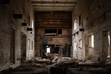 Interior Of The Old Ruined Abandoned Barn For Cows. Destroyed Agriculture
