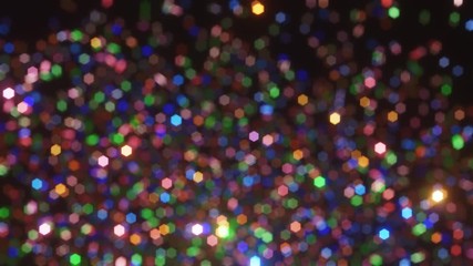 Wall Mural - Defocus glitter background with colorful falling confetti. Confetti explosions on a black background. 4K animation