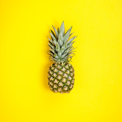 Pineapple on yellow background. Summer concept. Flat lay