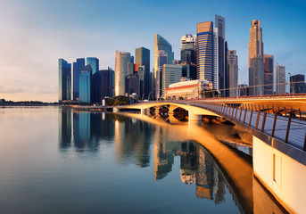 Singapore city skyline panorama at sunrise