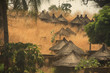 tradycyjne afrykańskie okrągłe chaty pokryte słomą wśród suchych traw