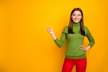 Wall Mural - portrait of confident cool girl promoter point index finger copyspace present ads promo sales wear c