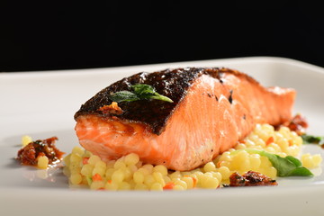 Wall Mural - Salmon Steak on Pasta Fregola with vegetable