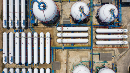 Wall Mural - Aerial view white storage tank gas in station LPG gas, LNG or LPG distribution station facility, Oil and gas fuel manufacturing industry.