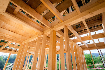 New interior residential wooden construction house framing